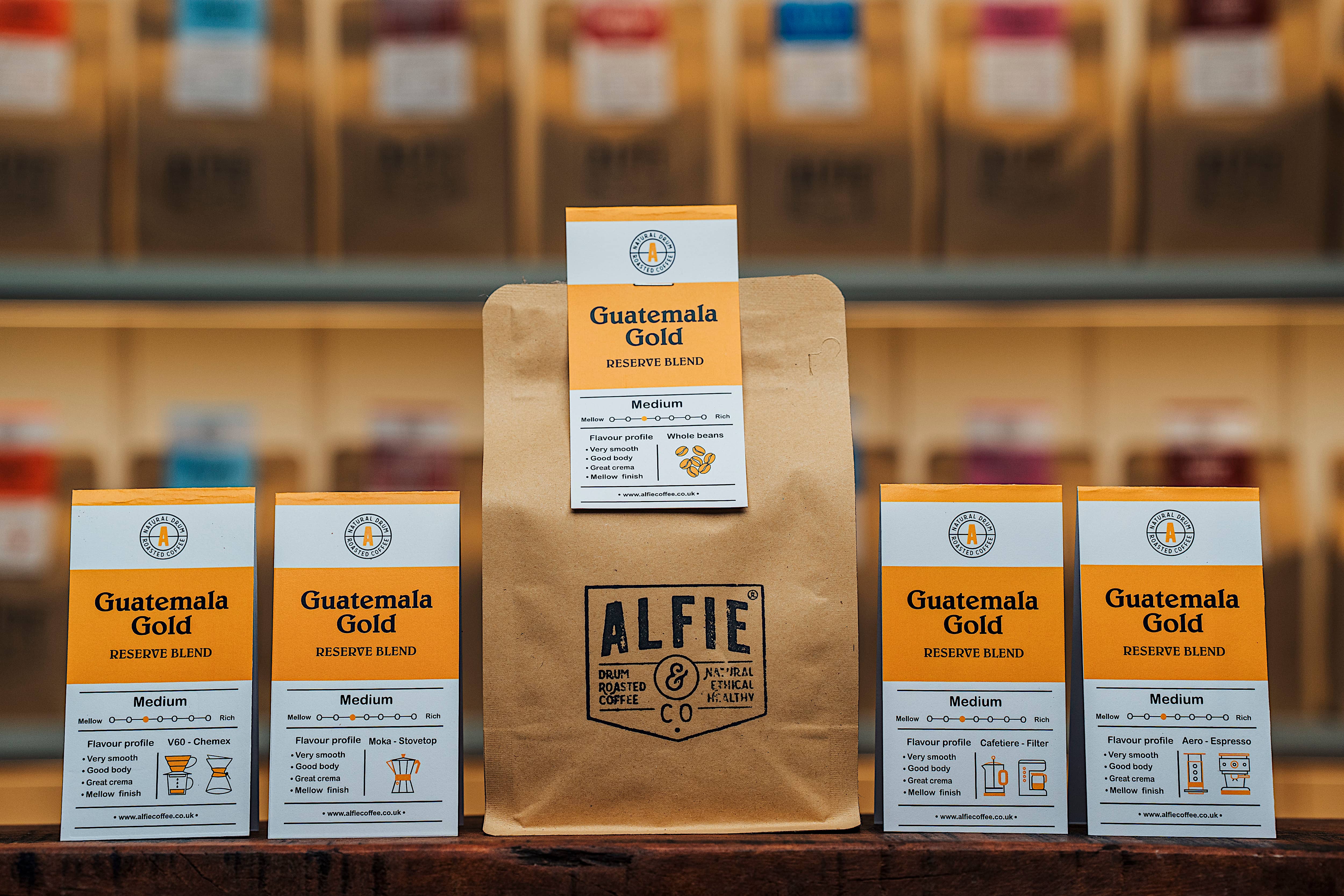Alfie & Co Coffee Roasters – Guatemala Gold whole-bean coffee surrounded by six matching grind options for V60, Chemex, Moka pot, Cafetiere, Filter and Espresso brewing.